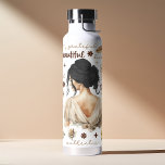 Watercolor Woman With Black Hair Boho Affirmation Water Bottle<br><div class="desc">Empower your day with this uplifting watercolor boho affirmation water bottle. Featuring a beautiful illustration of a woman with flowing black hair, this bottle is a reminder to embrace your natural beauty and celebrate your strength. The inspiring affirmations printed on the bottle will encourage you to stay positive and focused...</div>