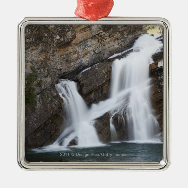 Waterfalls Coming Out Of A Rock Cliff Metal Ornament (Front)