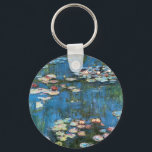 Waterlilies by Claude Monet, Vintage Impressionism Keychain<br><div class="desc">Waterlilies (1914) by Claude Monet is a vintage impressionist fine art nature painting. One of many variations of water lily floral paintings that Monet painted by the pond in his flower garden in Giverny, France. About the artist: Claude Monet (1840-1926) was a founder of the French impressionist painting movement with...</div>