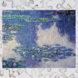 Waterlilies in Pond by Claude Monet, Vintage Art Jigsaw Puzzle<br><div class="desc">Waterlilies by Claude Monet is a vintage impressionism fine art nature painting featuring waterlilies in a pond in Monet's garden at his home in Giverny, France. Tree reflections are in the pond. A series of over 250 waterlily flower paintings that Monet painted during the last 30 years of his life....</div>