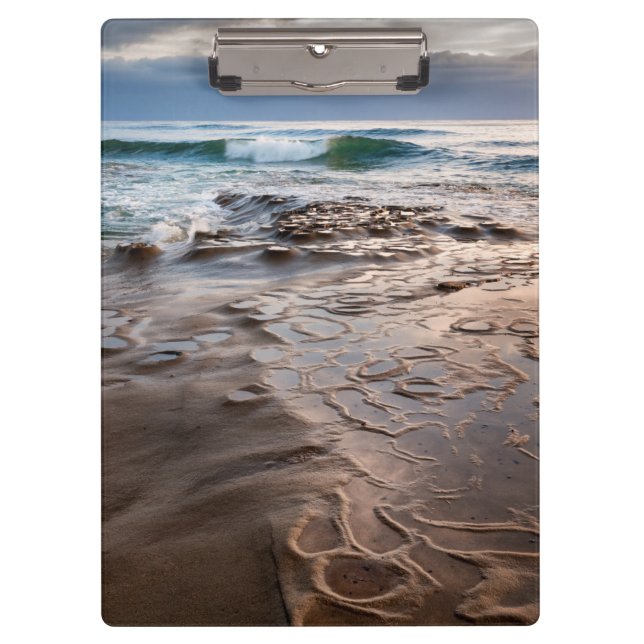 Wave breaking on beach, California Clipboard (Front)