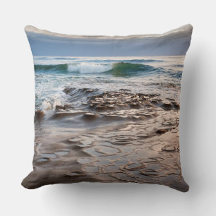 Wave breaking on beach, California Throw Pillow