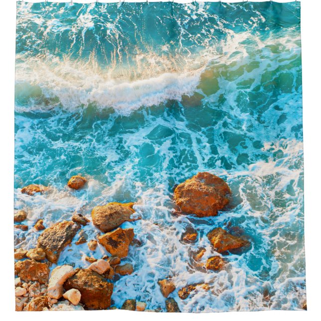 Waves on a rocky beach at sunset. Aerial viewbeach (Front)