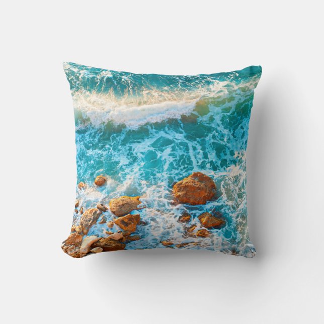 Waves on a rocky beach at sunset. Aerial viewbeach Throw Pillow (Front)
