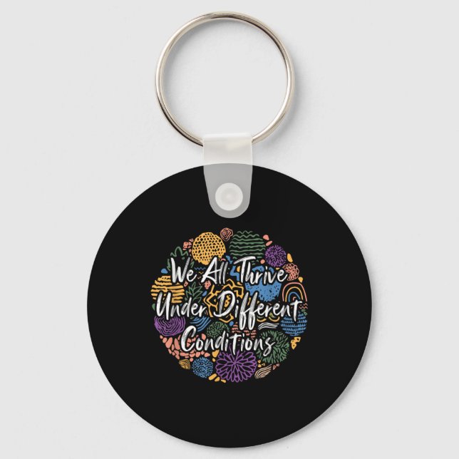 We All Thrive Under Different Conditions Diversity Keychain (Front)