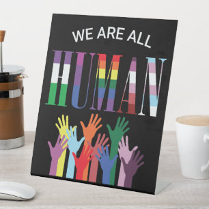 We Are All Human Colourful Hands Pedestal Sign