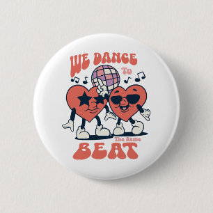 we dance to the same beat 2 inch round button