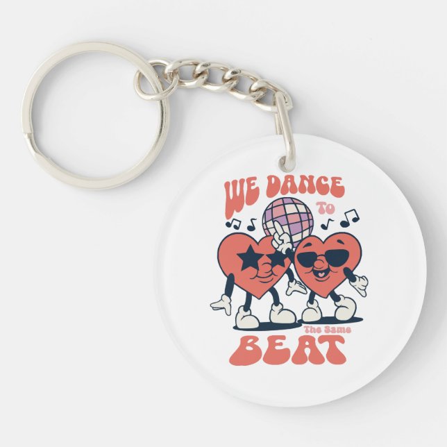 we dance to the same beat keychain (Front)