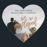 We Eloped Name Photo Artsy Script Heart Sticker<br><div class="desc">Handy for your mailings after your elopement, in a romantic heart shape, with your favourite photo of you both from your day which you simply upload to replace the sample. The typography is overlaid on top. We Eloped is in a modern artsy set script with a heart motif, and simple...</div>