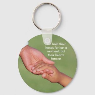 We hold their hands for just a moment, ... keychain