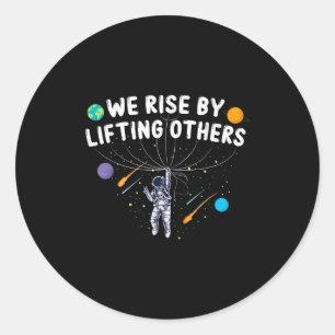 We Rise By Lifting Others Astronaut Sitive Motivat Classic Round Sticker