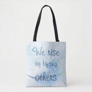 We rise by lifting others watercolor feather tote bag
