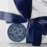 We Tied The Knot Rope Heart Nautical Navy & White Classic Round Sticker<br><div class="desc">We tied the knot? our minimal & elegant navy and white nautical wedding sticker is perfect for an ocean themed nautical wedding. The design features our hand-drawn heart-shaped rope knot illustration, The wedding date and name are incorporated into the heart knot design, creating a clean, minimal layout. The sharp white...</div>