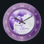Wedding Anniversary Purple Amethyst Roman Numerals Large Clock<br><div class="desc">A lovely clock in purple amethyst tones, with Roman numerals. The frame that functions as part of the clock is also a frame for your favourite wedding photograph. Keep the sample image of purple and white crocuses, or replace it with your own image for full personalization. Add your names and...</div>
