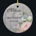 Wedding Anniversary Rustic Country Chic Floral Art Ceramic Ornament<br><div class="desc">Celebrate your wedding every year with this ornament that matches your wedding invitations and theme. Personalized with your names and wedding date on both sides. Also can be used as special wedding favours for parents, grandparents and siblings. Featuring a wildflower garden against a rustic wooden, reclaimed wood grey fence with...</div>