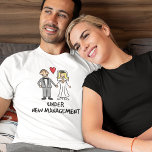 Wedding Couple - Under New Management T-Shirt<br><div class="desc">A cute cartoon of a newlywed couple captioned 'under new management'. Is it the bride or groom that wears the trousers in the marriage? Great for a wedding gift,  or to wear on honeymoon.</div>