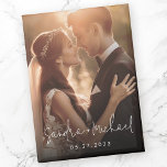 Wedding engagement couple names date photo magnet<br><div class="desc">Fridge magnet featuring the couple's names in a handwritten style script font with the date below as an overlay over a custom photo.</div>