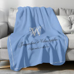 Wedding Gift Elegant Monogram Newlywed Keepsake Fleece Blanket<br><div class="desc">Wedding Gift Elegant Monogram Newlywed Keepsake Fleece Blanket. Personalized beautiful blue and light grey monogrammed Fleece Blanket. Classic script monogram last name initial, and bride and groom names and the marriage date on a simple elegant blue background. The perfect gift for newly weds, a cherished reminder of their special day...</div>