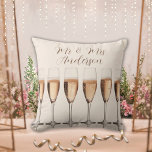 Wedding Gift Row of Pink Champagne Glasses Throw Pillow<br><div class="desc">This stunning wedding pillow features a row of elegant champagne glasses,  perfect for celebrating the newlywed couple. Personalize it with the couple's name in beautiful script for a truly unique touch. A thoughtful bridal shower or wedding gift that will be cherished for years to come.</div>