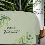 Wedding Party Palm Leaf Any Colour Bridesmaid Dopp Kit<br><div class="desc">Bridal party gift to personalize for your bridesmaid - or anyone in your wedding party. Bridesmaid is lettered in swirly handwritten calligraphy and, you can easily switch this to a different role, by entering the design tool. The design features a watercolor tropical palm leaf which is also used in the...</div>