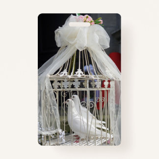 Wedding pigeon waiting for bride badge