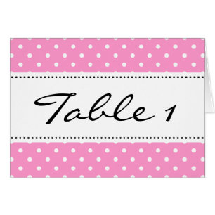 Wedding table place cards with pink background