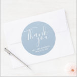 Wedding Thank You Blue Wedding Favour Classic Round Sticker<br><div class="desc">Wedding favour stickers in blue and white. Say thank you to your wedding guests with these personalized wedding stickers in a gorgeous script font that read: Thank you. Personalize with your names and wedding date. The background colour of these stickers can be changed to colour of your choice by contacting...</div>