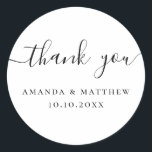 Wedding Thank You | Minimalist Calligraphy Favor Classic Round Sticker<br><div class="desc">Add a polished finishing touch to your wedding stationery with this round “Thank You” sticker featuring elegant modern calligraphy and a clean, minimalist design. Perfect for sealing invitation and RSVP envelopes, closing thank you cards, and decorating wedding favors or small gift packaging. Designed to complement modern, classic, and minimalist wedding...</div>