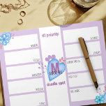 Weekly Planner Daily To Do Lilac Doodles Monogram Notepad<br><div class="desc">Monogrammed custom weekly planner with 12 sections for you to prioritize tasks, organize your week and keep your doodles in one spot! The design features doodle style hearts and flowers in a pretty colour palette of lilac and blue. The template is set up for you to add your name and...</div>