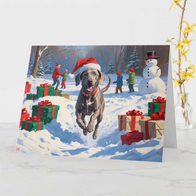 Weimaraner Running in Snow with Christmas Hat Card (Yellow Flower)