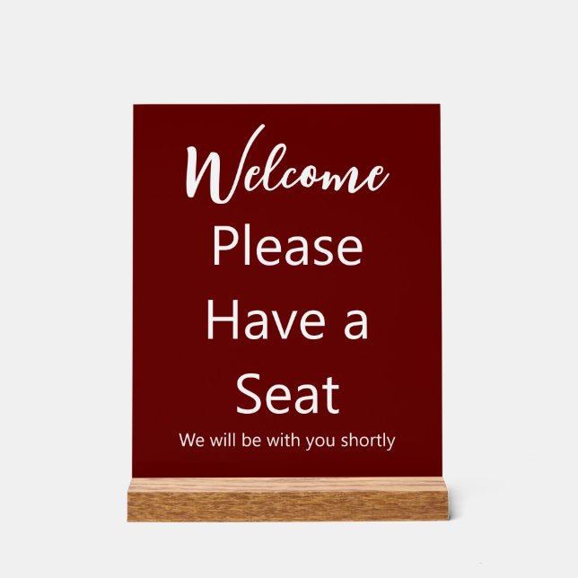 Welcome Please Have a Seat Dark Red and White Text Acrylic Sign (Front)