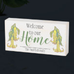 Welcome to our Home.  Personalised family name. Wooden Box Sign<br><div class="desc">Welcome visitors to your home with this wooden box sign decorated with drawings of yellow angel trumpet flowers and the words: Welcome to our Home.  It's personalised with your family's name.</div>