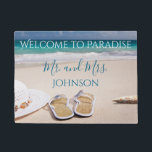 Welcome to Paradise Beach Mr and Mrs Doormat<br><div class="desc">If you love the beach, than you will love this beach sand and sea photo. Featuring a lovely beach theme "Welcome to Paradise" "Mr. and Mrs." is written beneath in blue font. Personalize your name underneath. Adjust the size of the photo and text if you increase the size of the...</div>