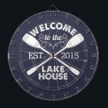 Welcome to the Lake House | Rustic Canoe Paddles Dartboard<br><div class="desc">Spend your leisurely lakeside hours playing darts with this fun,  unique dartboard. Design features a midnight blue background with "Welcome to the Lake House" in rustic block text and two crossed canoe paddles. Customize with the year established for an awesome housewarming present or gift for your weekend hosts!</div>