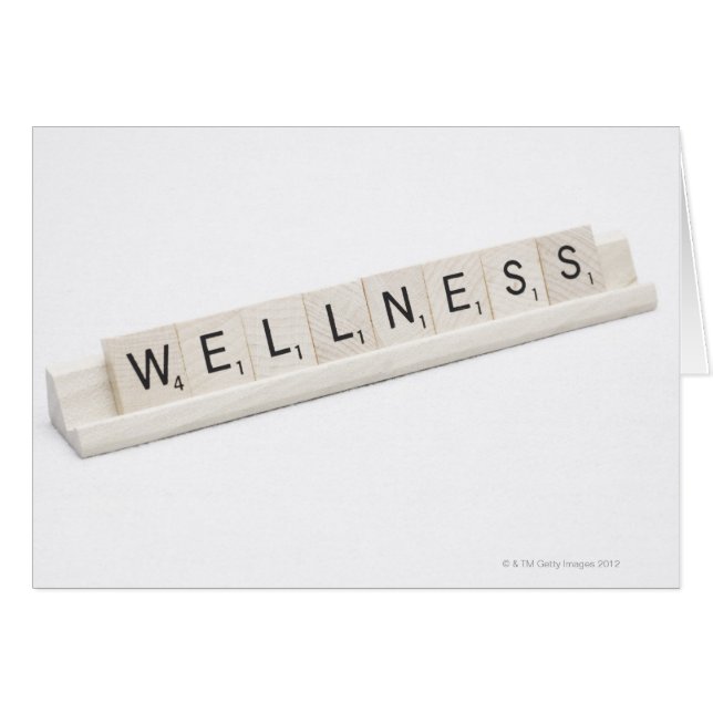 Wellness Spelled On A Word Board Game. (Front Horizontal)