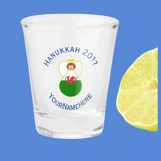 Welsh Angel Hanukkah Flag Personalized  Shot Glass (Shot glass with angel dressed in Welsh Flag for Hanukkah. Blue text for name, year, and holiday.)