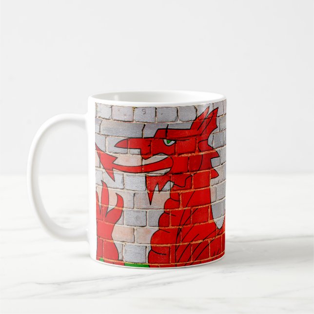 Welsh dragon on a brick wall coffee mug (Left)