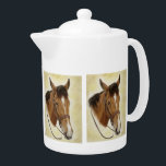 Western Horse Teapot<br><div class="desc">Add charm to your kitchen with a pretty western horse inspired teapot! Handsome and practical, this equine porcelain teapot will bring your unique style to the table. Beautifully designed from an original oil painting titled “Safe Passage” by Artist Cathy Cleveland.</div>