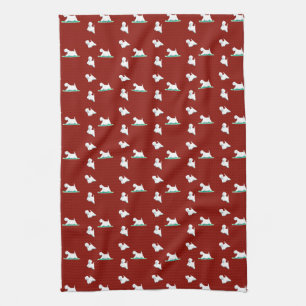 Westie on red kitchen towel