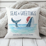 Whale Santa Sea Watercolor Coastal Christmas Throw Pillow<br><div class="desc">Add some nautical fun to your holiday decor with this Christmas cotton throw pillow featuring a watercolor whale wearing a Santa hat swimming in the sea with string lights decorating its tail. The "Seas & Greetings" and "Wishing you a whale of a good Christmas" greetings can be personalized. The reverse...</div>