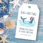 Whale Santa Sea Watercolor Nautical Christmas<br><div class="desc">Add some nautical fun to your holiday presents with these Christmas gift tags featuring a watercolor whale wearing a Santa hat swimming in the sea with string lights decorating its tail. The "Seas & Greetings" and "Wishing you a whale of a good Christmas" greetings, along with the name can be...</div>