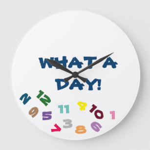 **WHAT A DAY** SAYS THIS FUN AND COOL CLOCK