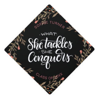 What she tackles she conquers -Brown - Graduation Cap Topper