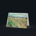 Wheatfield with Cornflowers | Vincent van Gogh Card<br><div class="desc">Wheatfield With Cornflowers (1890) by Vincent van Gogh (Dutch, 1853–1890) is a vivid and emotionally charged landscape from the artist’s final year. In this painting, Van Gogh captures a golden wheatfield punctuated with brilliant blue cornflowers, using his signature bold brushwork and dynamic colour contrasts. The composition conveys both the beauty...</div>