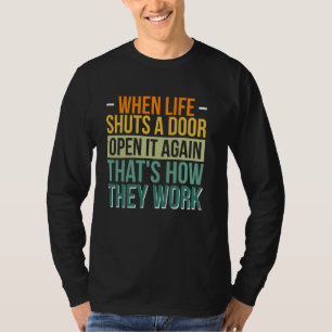 When Life Shuts A Door Open It Again That's How Th T-Shirt