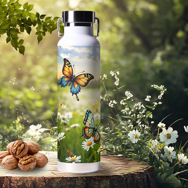 Whimsical Blue Orange Butterflies in Daisy Meadow Water Bottle (Water bottle featuring colorful artistic butterflies on a meadow with daisies on a sunny spring day)