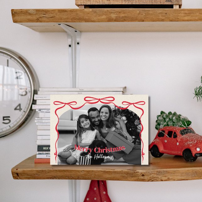 Whimsical Bow Family Photo Christmas Holiday Card (Send warm holiday wishes with a touch of charm using this whimsical red bow Christmas photo card.)