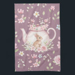 Whimsical Bunny Teapot Floral Spring  Kitchen Towel<br><div class="desc">Cute bunny peeking from behind a floral teapot. Dark purple background with delicate pink and white blossoms. Perfect for adding a touch of cottagecore charm to any home, or as a thoughtful gift for nature lovers, tea enthusiasts, and anyone who adores cute animals and beautiful flowers. A truly special piece...</div>