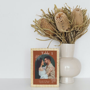 Whimsical burnt orange terracotta wedding decor table number