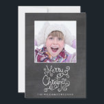 Whimsical Christmas Chalkboard Calligraphy Photo Holiday Card<br><div class="desc">Spread some holiday cheer with this fun holiday photo card featuring a whimsical Merry Christmas Typography/Calligraphy design, your photo and name set against a black chalkboard background. The backside features another photo and your custom holiday message. Trendy and fun, yet simple and classic, it's sure to make friends and family...</div>